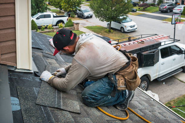 Professional Roofing technician working in Kelton, PA